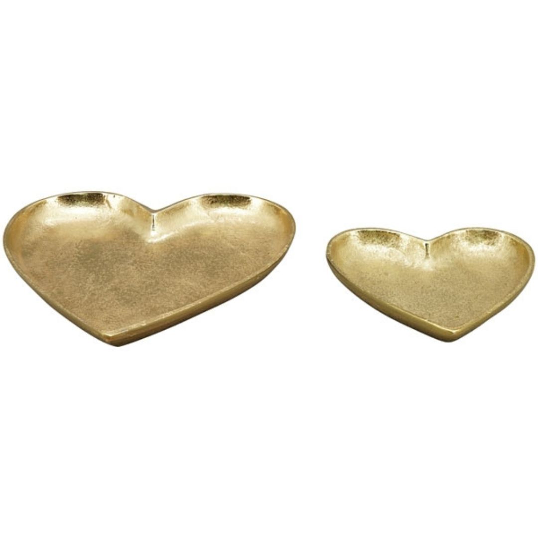 Herzförmiger goldener Metallteller für ein romantisches Abendessen